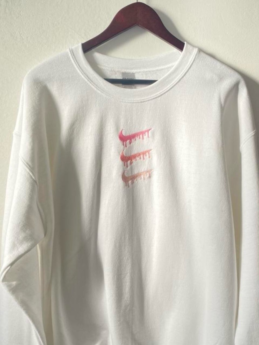 White Crewneck Sweatshirt with Pink Drip Swooshes